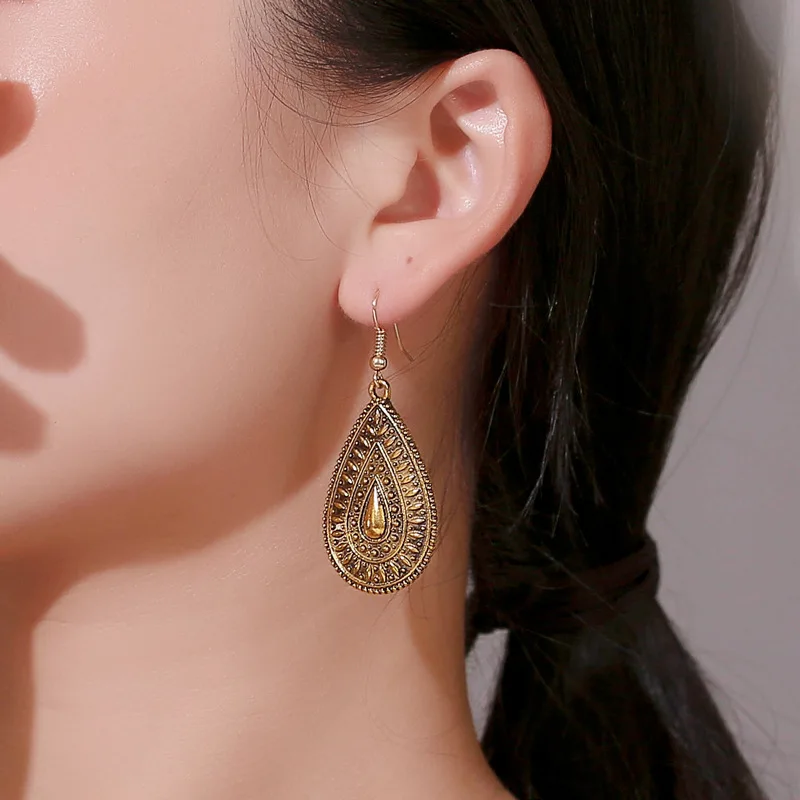 

Vintage Carved Water Drop Earrings For Women Gold Metal Bohemia Ethnic Peacock Tail Earring Party Wedding Jewelry Gift