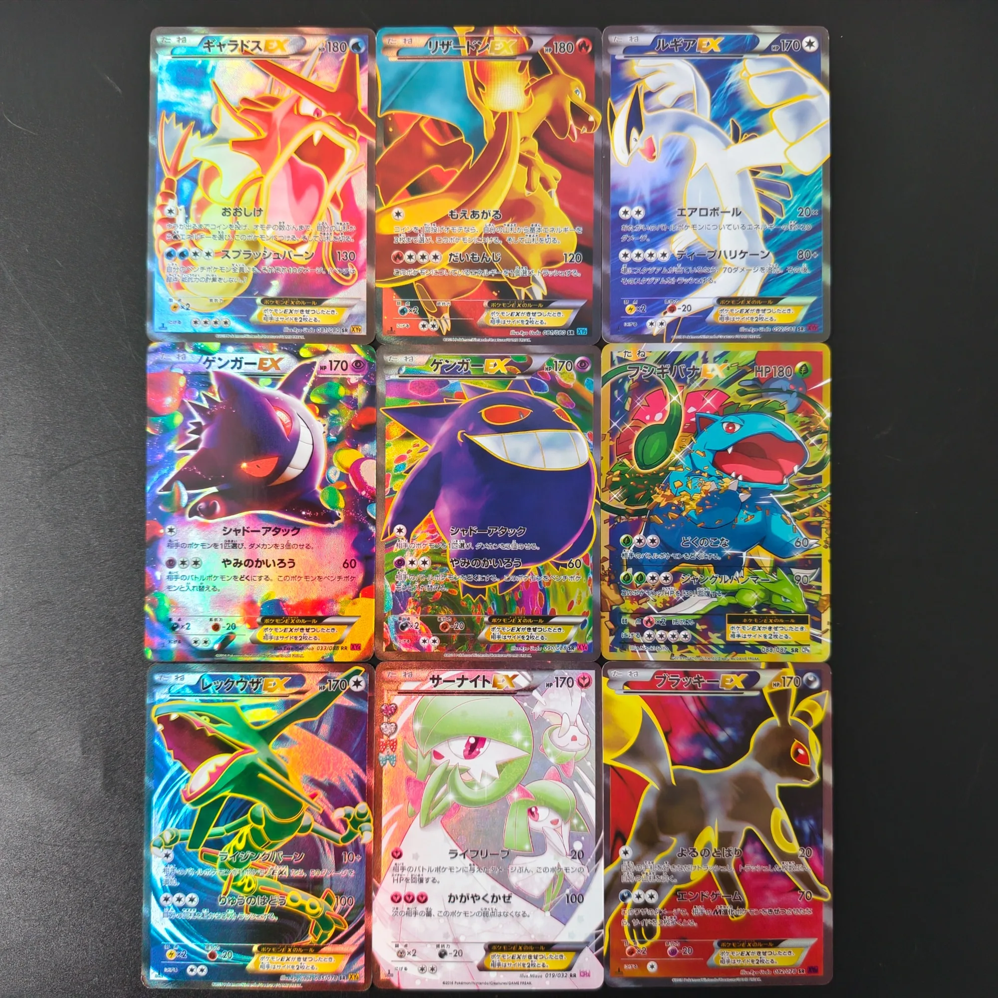 Фото Набор из 9 коллекционных карт Pokemon EX с полной арт-принткой и голографическим эффектом: Гарарус, Чаризард, Лугия, Генгар, Венузавр. Карточная игра TCG, аниме-карточки. №1