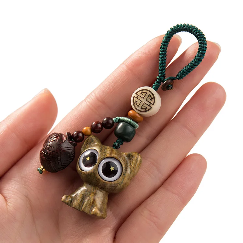 

Star cat sandalwood keychain pendant creative hand-woven rope car chain personalized mobile phone U disk rope bag pendant