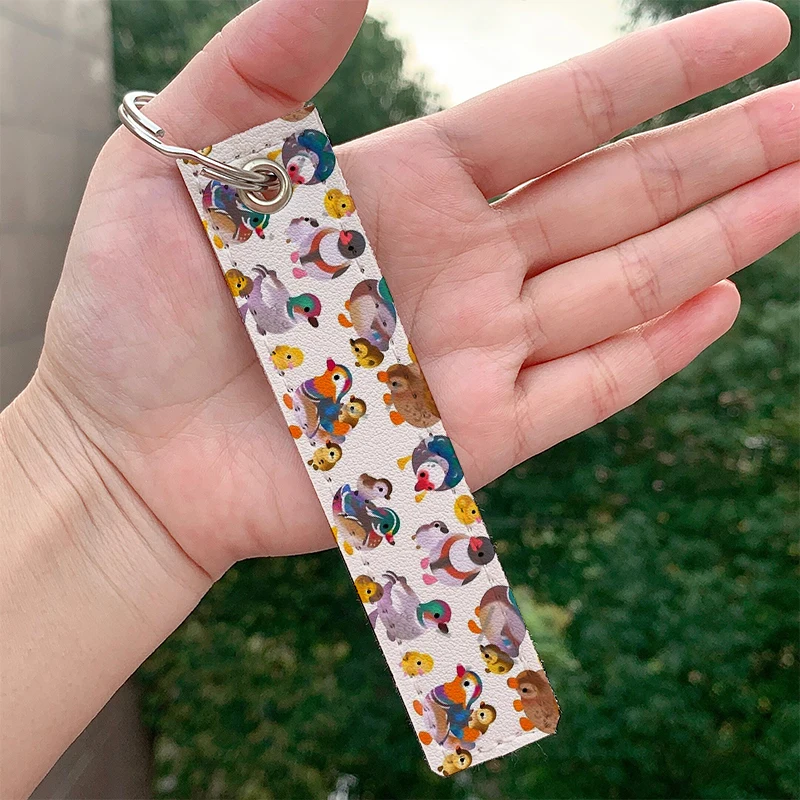 

Fashion Duck and Duckling leather motorcycle Key chain Strap Key rings Hanging Holder Bag Wallet Trinket Keychain Hanging Bag