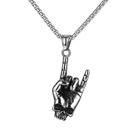 a classic titanium steel necklace with skull fingers