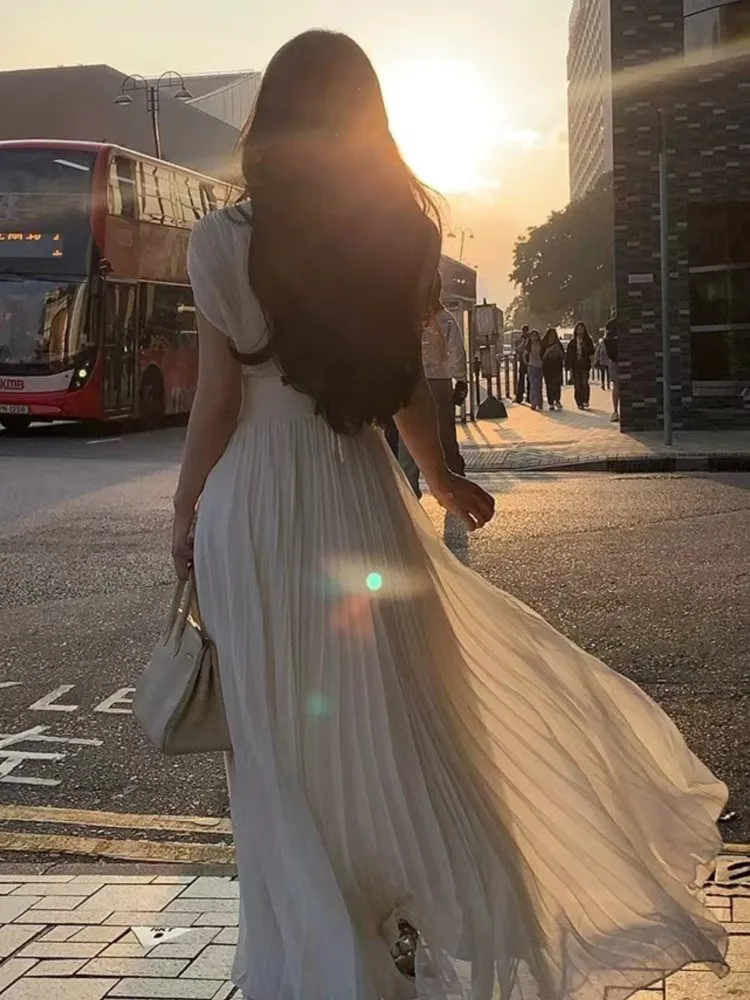 Женское длинное платье с V-образным вырезом без рукавов