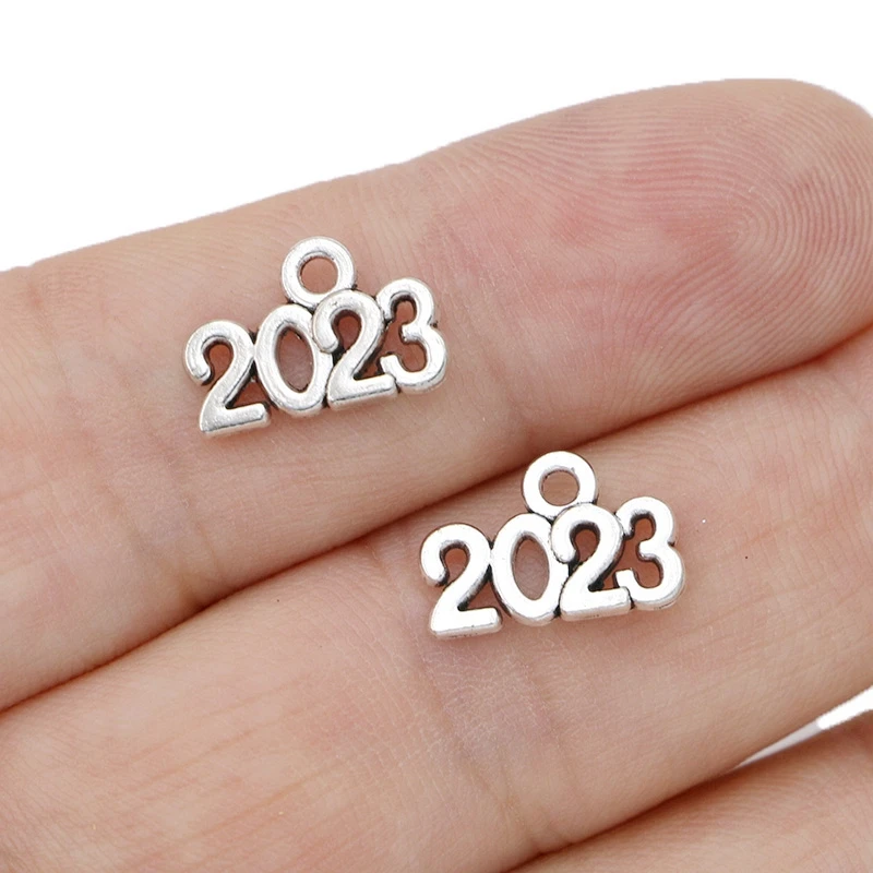 

40Pcs 2023 Year Tags Charms Antique Silver Plated Pendants for Jewelry Making Bracelet DIY Handmade Craft 14x9mm