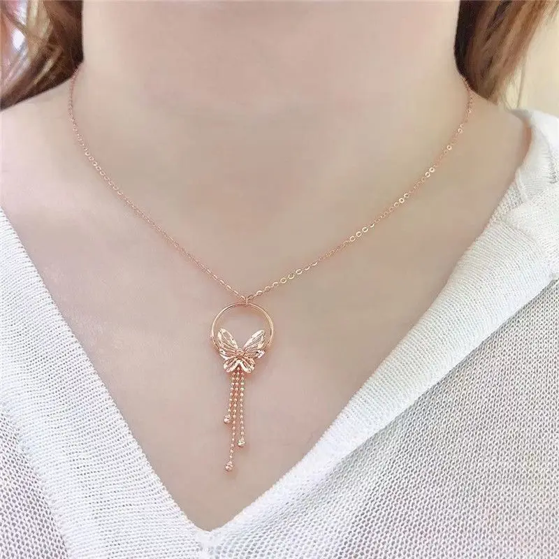 

Ожерелье женское из розового золота 14 к с бабочкой и кисточками