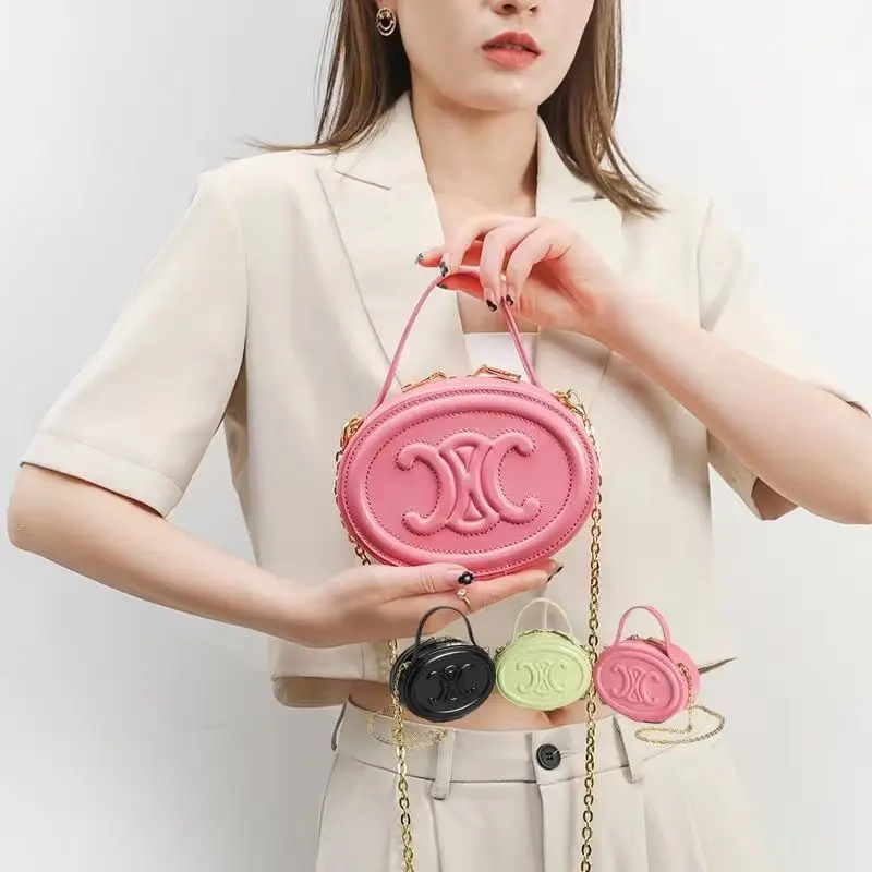 

Сумка женская круглая, маленькая розовая сумочка на плечо с наклонным верхом, с изображением свиньи, носа, Луны, торта, весна-лето