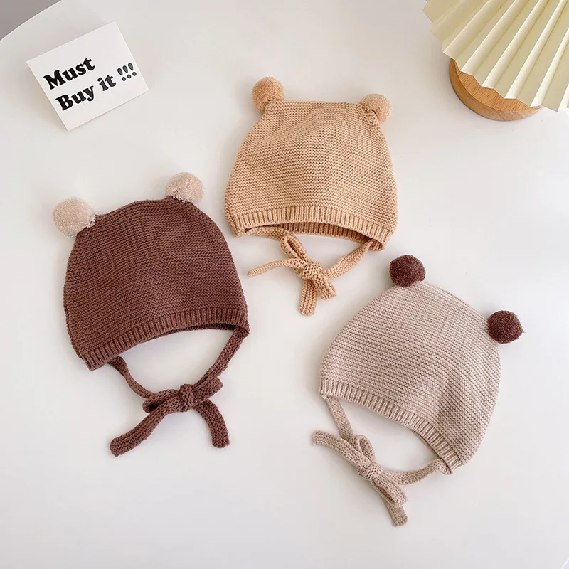 

Hot Sale Baby Autumn and Winter Cute Baby Woolen 4-28 Months Winter Male and Female Children Ear Protection Knitted Hat