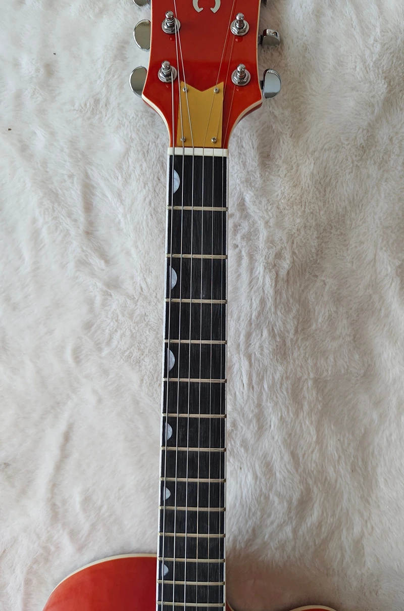 Электрическая гитара с грифом из палисандра