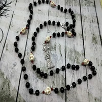 how to pray the santa muerte rosary saint of death dead occult mexican death reaper jewelry skull skully offering sacrifice
