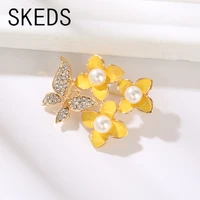 skeds elegant women enamel flower pearl brooches pins fashion crystal butterfly plant jewelry for lady clothing coat brooch pin
