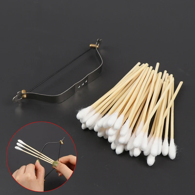 

1Set Creative Mini Cotton Swab Launcher Shooting Toys Safety Children Toys Model Cotton Swab Bow Gift