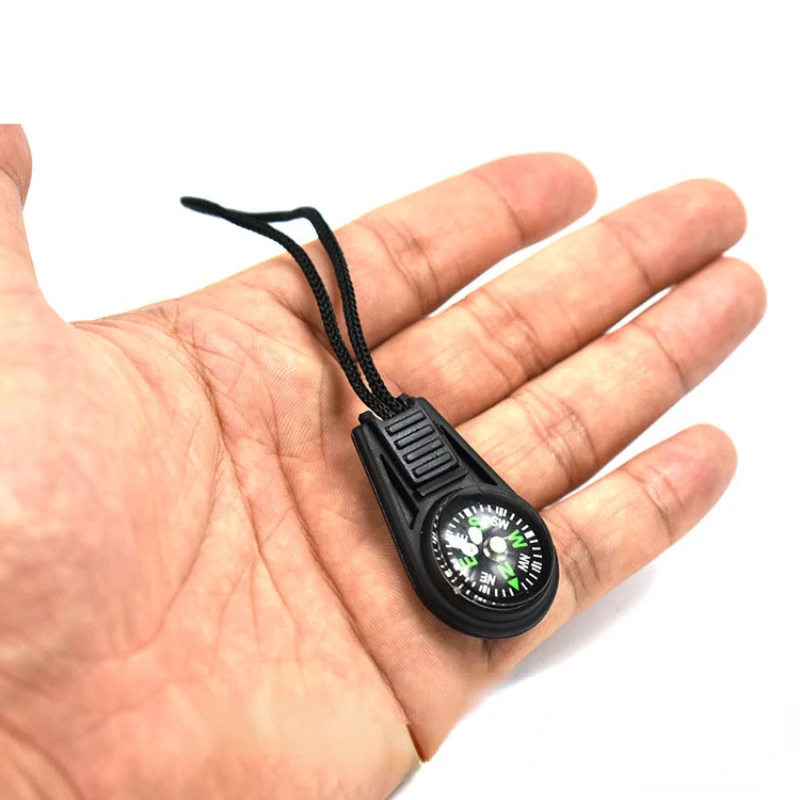 

New 1pc outdoor logo directional compass multifunctional portable compass backpack tail rope buckle compass pendant