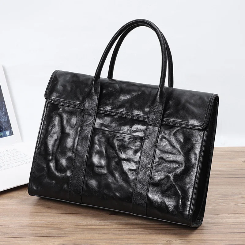 AETOO  New men's handbag hand grasp leather men's baotou layer cowhide single shoulder crossbody bag men's briefcase