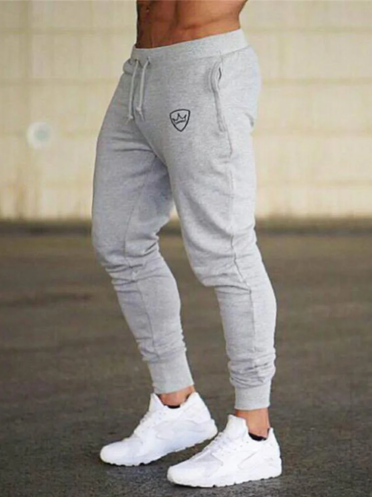 

2022 Fashion Men Gyms Pants Joggers Fitness Casual Long Pants Men Workout Skinny Sweatpants Jogger Tracksuit Cotton Trousers