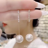 xin yi yi pearl tassel earrings in 2022 the new online sensation light luxury suitable for round face earrings