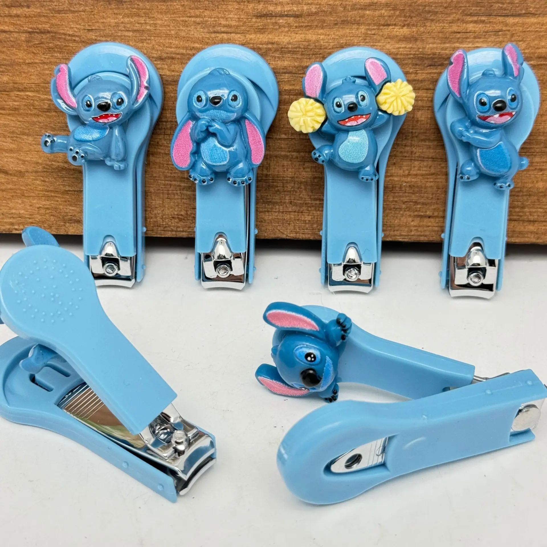 Фото Disney Loli and Stitch, зажимы для ногтей, милые стички, аниме-фигурки, товары для дома, ножницы для ногтей из нержавеющей стали, игрушки, подарки №2