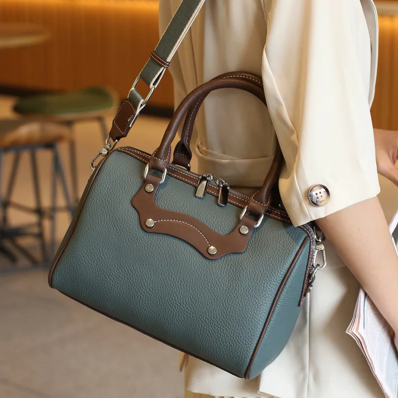 

In 2023, the new fashion ladies' bag color Boston handbag leather handbag shoulder his pillow package handbags for women