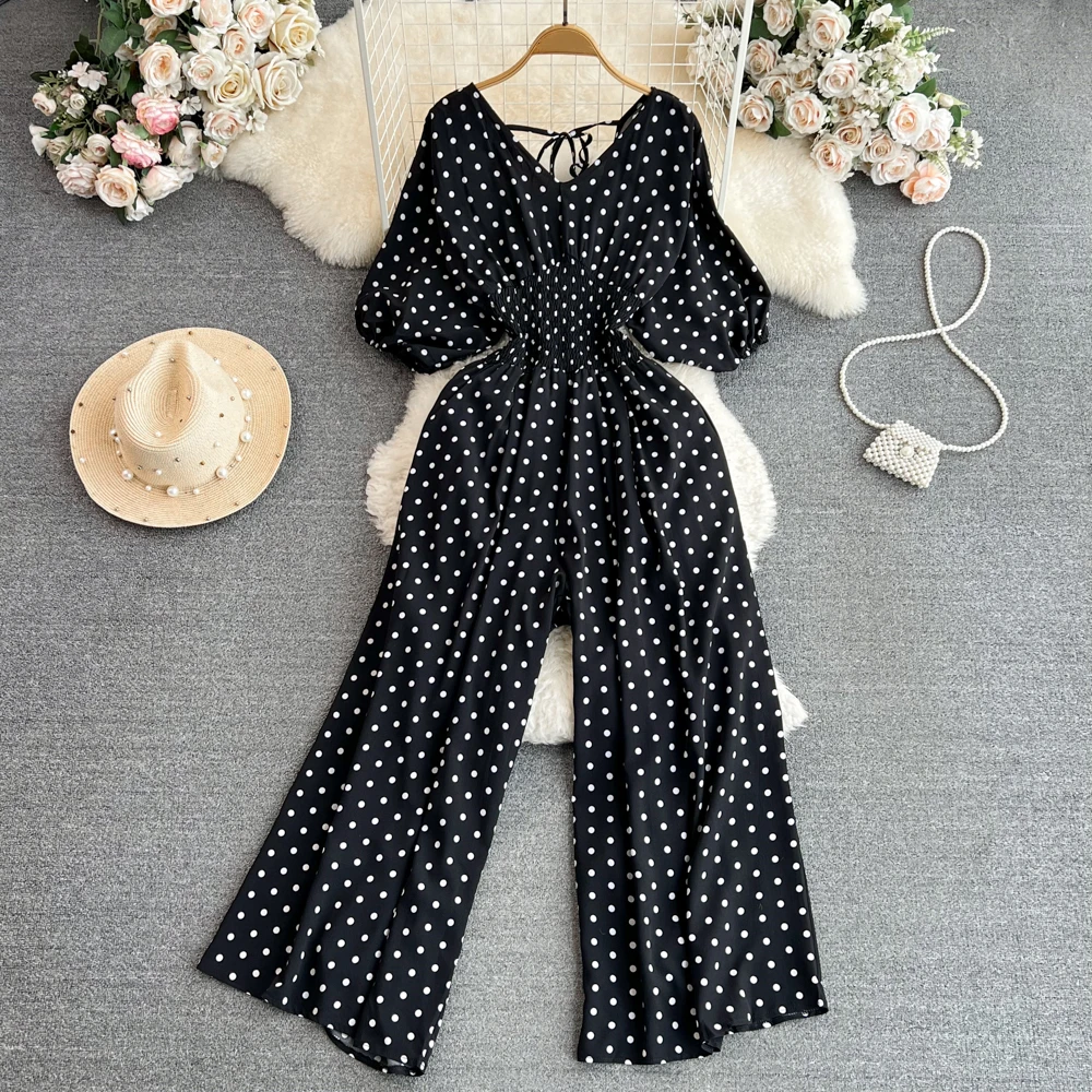 Clothland Women Elegant Polka Dot Jumpsuits V Neck Backless Lace Up High Waist Wide Leg Trousers Chic Playsuits KA359