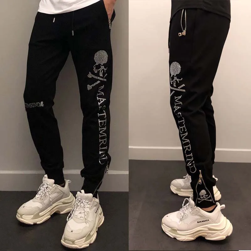 

2022 MASTERMIND personality new MMJ goods skull hot drill casual pants men's small feet slim pants KZ794