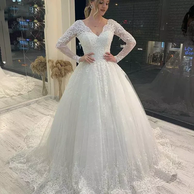 

Romantic V-Neck Wedding Dress Lace Applique Tulle Vestidos De Noiva Long Sleeve Backless Ball Gown Bridal Dresses Robe De Mariee