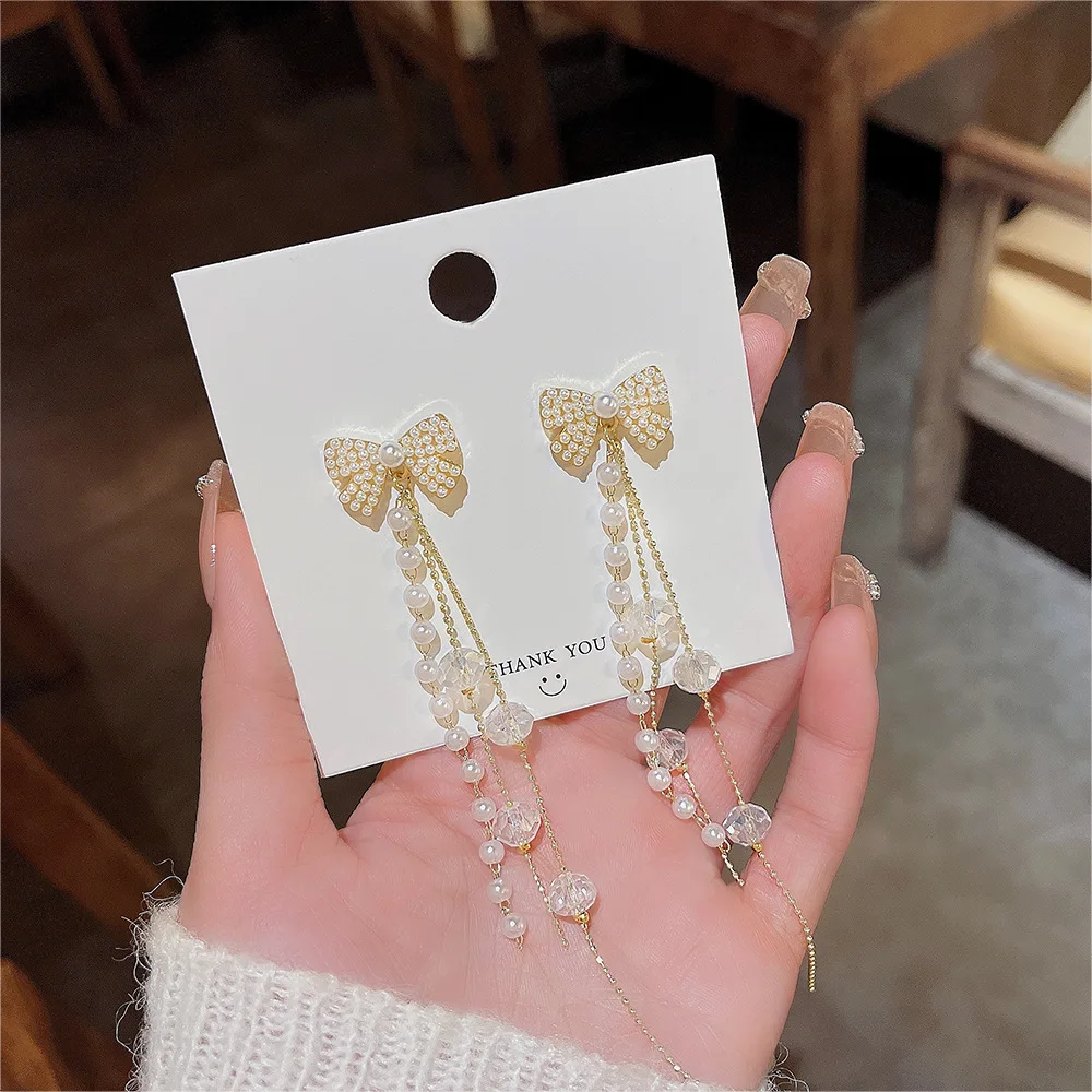 

S925 Silver Needle Light Luxury Pearl Bowknot Design Long Chain Fringe Tassel Earrings Women's Ins Style Ear Studs Ear Jewelry