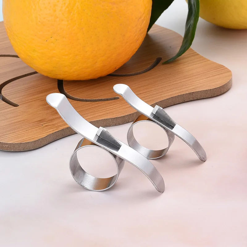 

Stainless steel orange opener finger ring orange peeler snail orange peeler pomelo pomegranate peeler peel orange