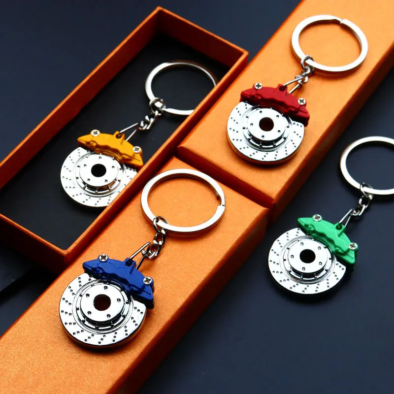 

Cute Metal Auto Parts Disc Brake Shock absorber Keychain Hub Calipers Key Ring For Car Pendant Key Chain For Men Gift Trinkets