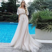 gorgeous ivorytulle appliques floor length wedding dresses a line off shoulder tuffles sleeves buttons back bridal maid gowns