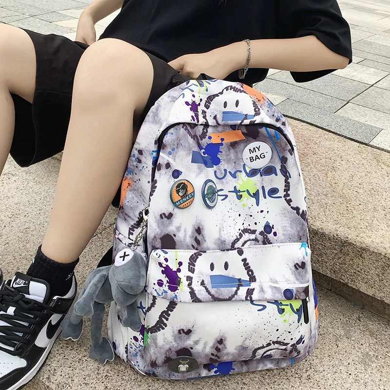 

Unisex Large Capacity Students Backpack Korean Japanese Fashion Boys Girls Schoolbag Graffiti Style Packbag Travelling Bag New