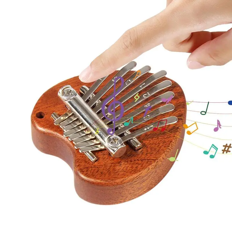 

Mini Kalimba Heart Shaped Finger Thumb Piano 8 Key Marimba Musical Good Accessory Piano Gift For Beginners Music Lovers