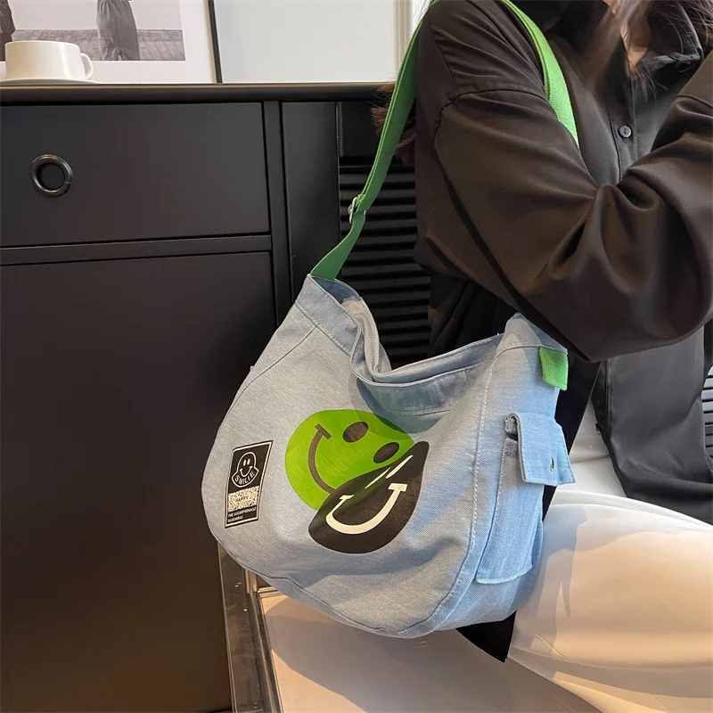 2023 New Canvas Female Korean Smiley Cartoon Crossbody Female Student Large Shoulder Underarm Bag
