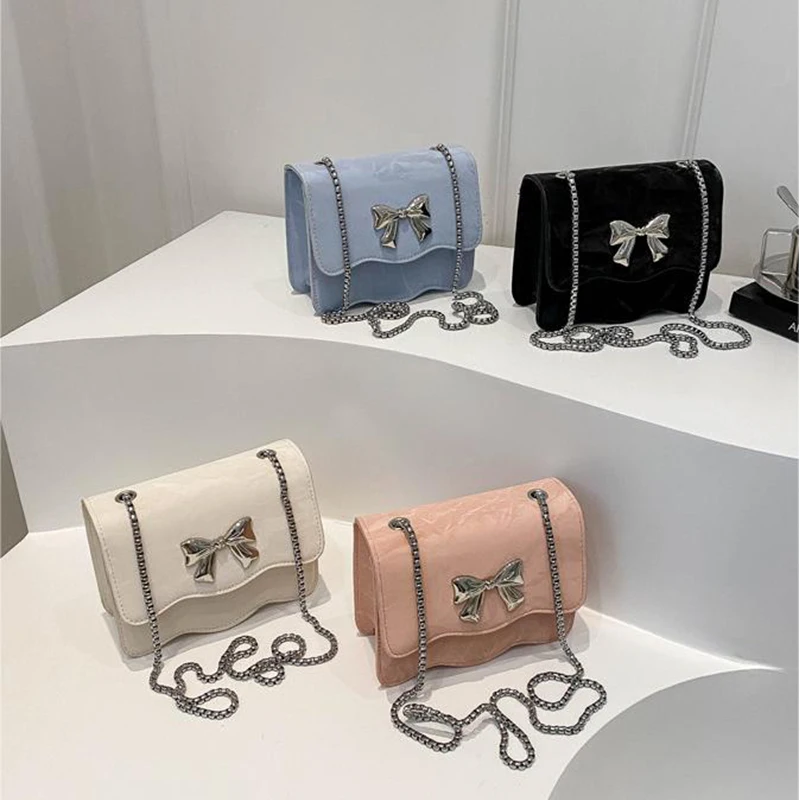 Корейская версия сумка с бантом на цепочке новая однотонная модная через плечо