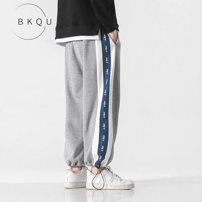 

BKQU Splicing pants male high street tide ins who smoke straight strand foot trousers wide-legged gray sweatpants