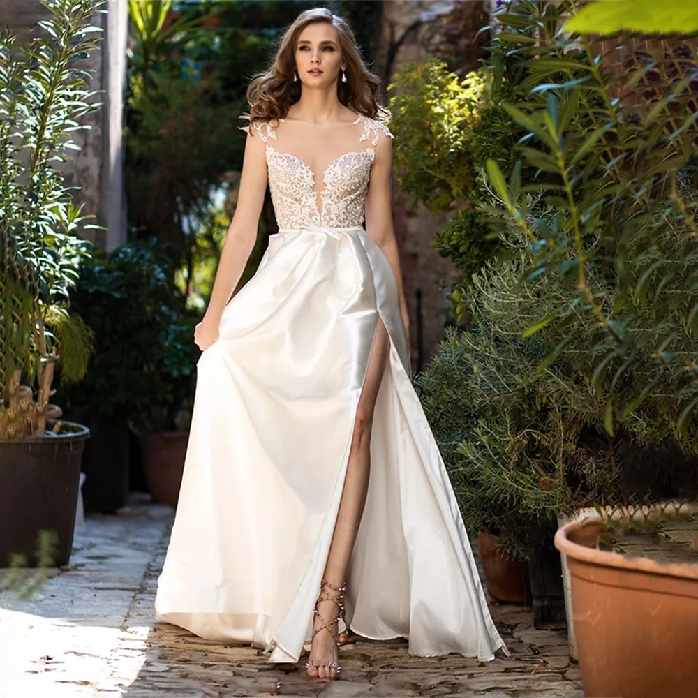 

Sexy Elegant 2022 Satin Wedding Dress O-Neck A-Line Lace Appliques Cap Sleeves Side Split Illusion Back Buttoned Custom Made