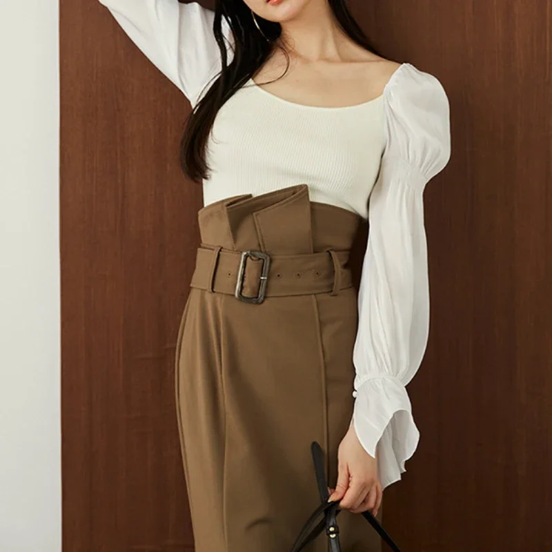 Женский свитер с пышными рукавами-фонариками и воротником-стойкой