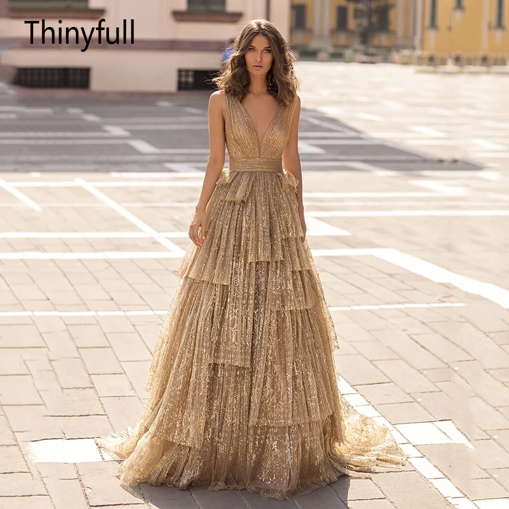 

Sparkling V Neck Tiered Evening Dresses Shiny Spaghetti Strap Prom Gowns For Party Gold Backless Cocktail Dress for Women 2022