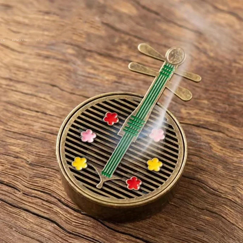 

Металлическая курильница в форме лотоса