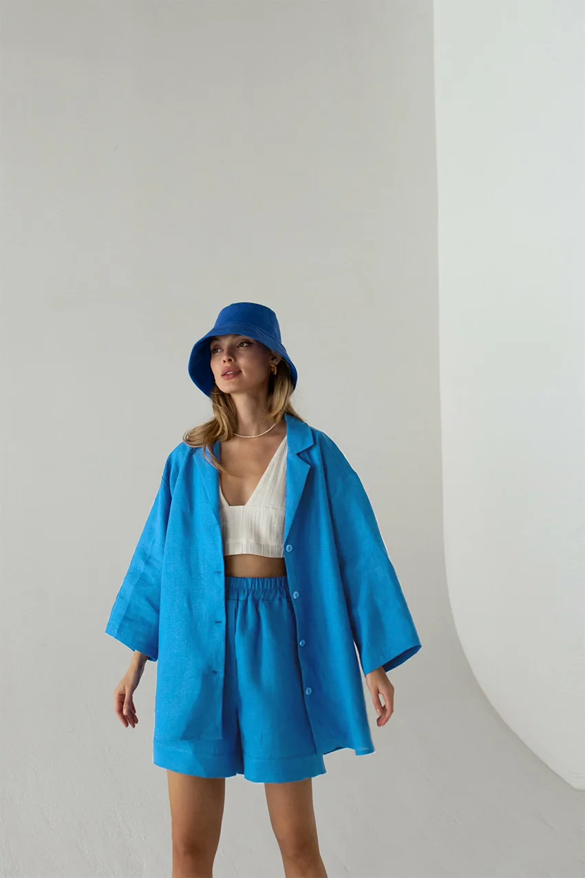 

Женский Повседневный костюм из двух предметов, однотонный топ с воротником с отложным воротником и пуговицами и свободные шорты с эластичн...