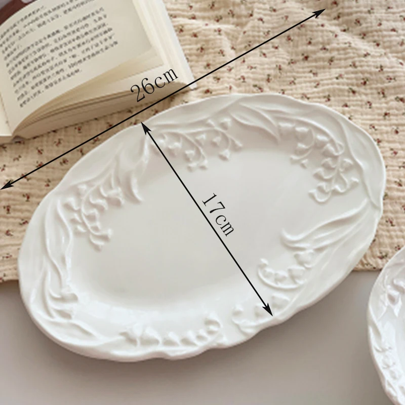 

Керамическая тарелка с ландышами