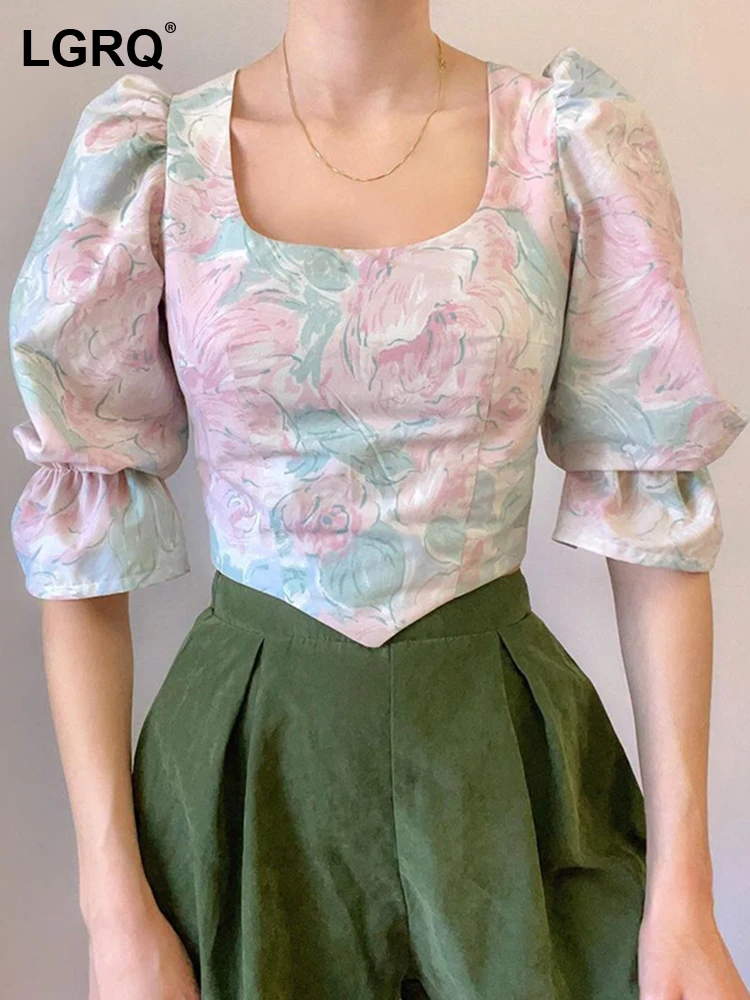 

Женская блузка с принтом на пуговицах, полурукавом и открытой спиной