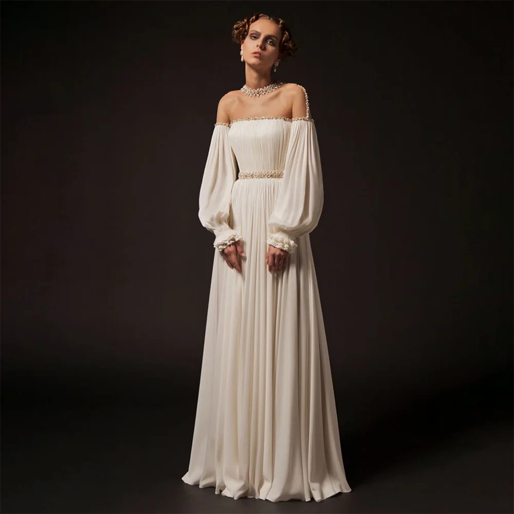 Женское вечернее платье с длинным рукавом и бусинами