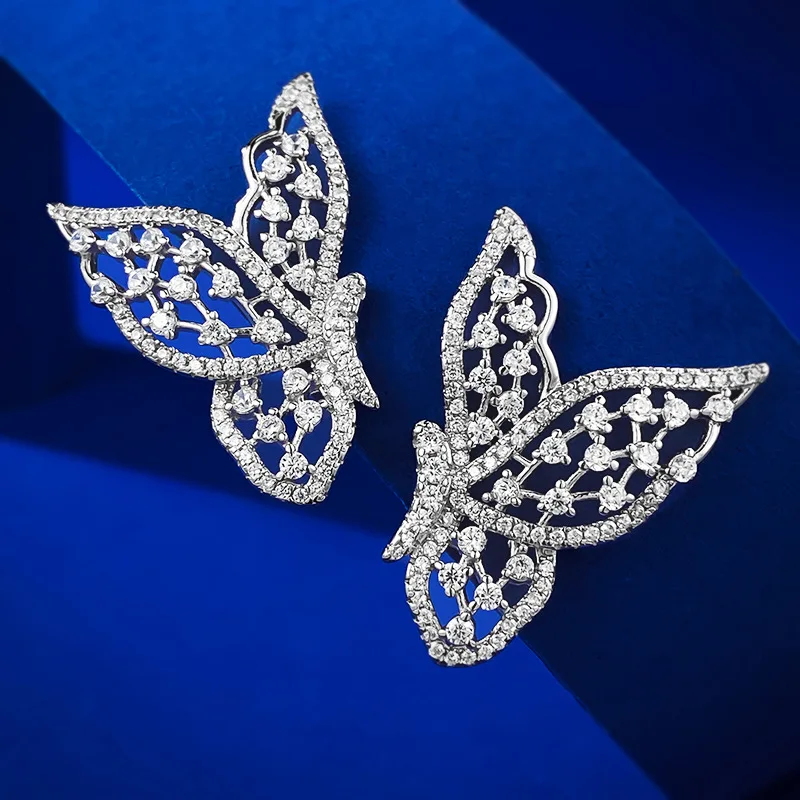 

2023 New S925 Silver Hollow Butterfly Ear Studs Women's Simple Personality Ear Studs INS Cross border