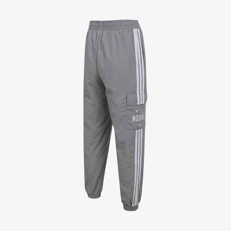 Фото Оригинальные детские спортивные брюки Adidas серого цвета с эластичным поясом и спортивным дизайном, модель KG6611. №3