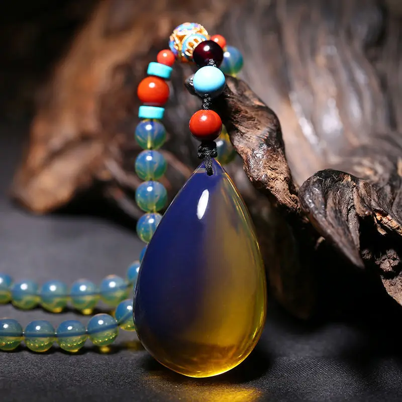 

Natural Dominican amber pendant 5A-grade purified water blue pearl drop pendant beeswax necklace sweater chain for men and women