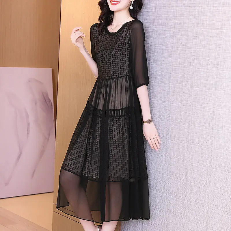 

Dress casual female summer 2022 high-end temperament black fashion middle-aged mother foreign solid o neck short sleeve skirt