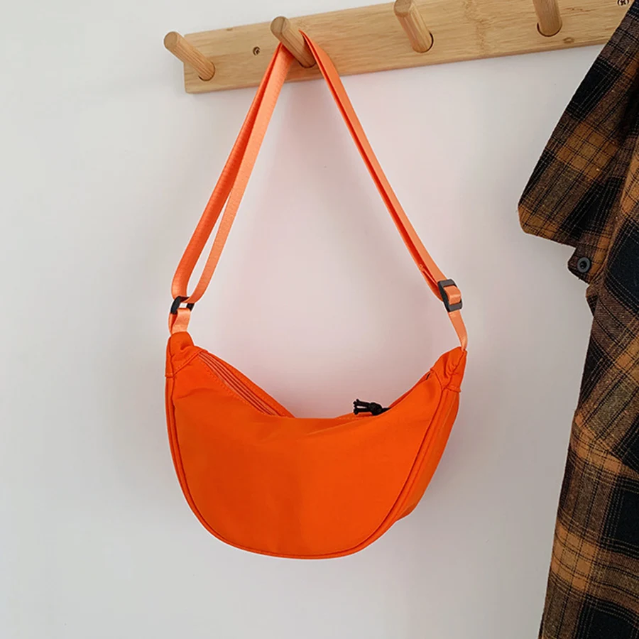 

Korean solid color simple casual messenger bag women's handbag trend large-capacity nylon one-shoulder dumpling bags waist bag
