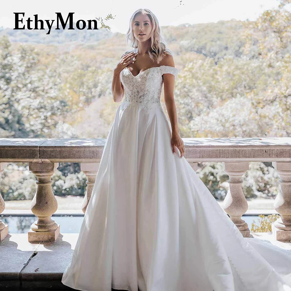 

Ethymon Fashionable A-line Brides Wedding Dresses Off the Shoulder Lace Appliques Sequined Backless Abito Da Sposa Customized