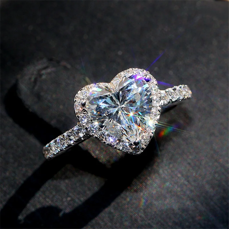

Роскошное серебряное кольцо в форме сердца для женщин, изысканная модная металлическая вставка из белого циркона, свадебное кольцо, обруча...