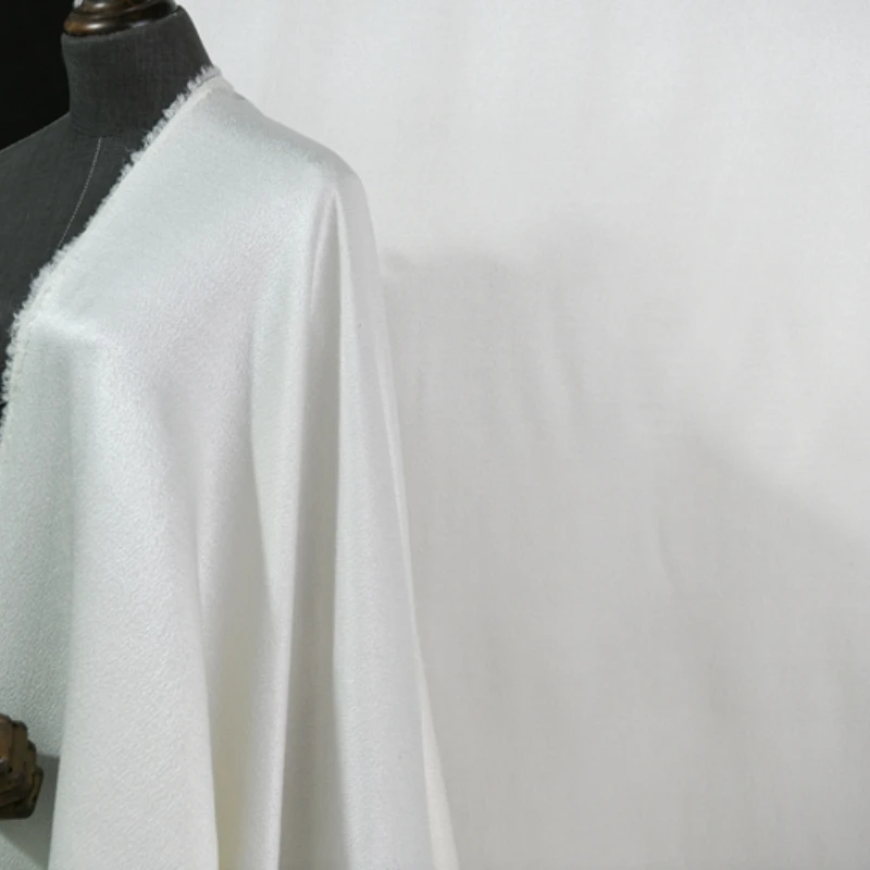 

Water Ripple Ghost Crepe Satin Fabric Brand Fashion Design Moon White Satin Clothing Material for Sewing by the Meter Wholesale