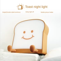 creative led cartoon cute toast bread night light mobile phone bracket usb bedroom bedside night light cute light lamp