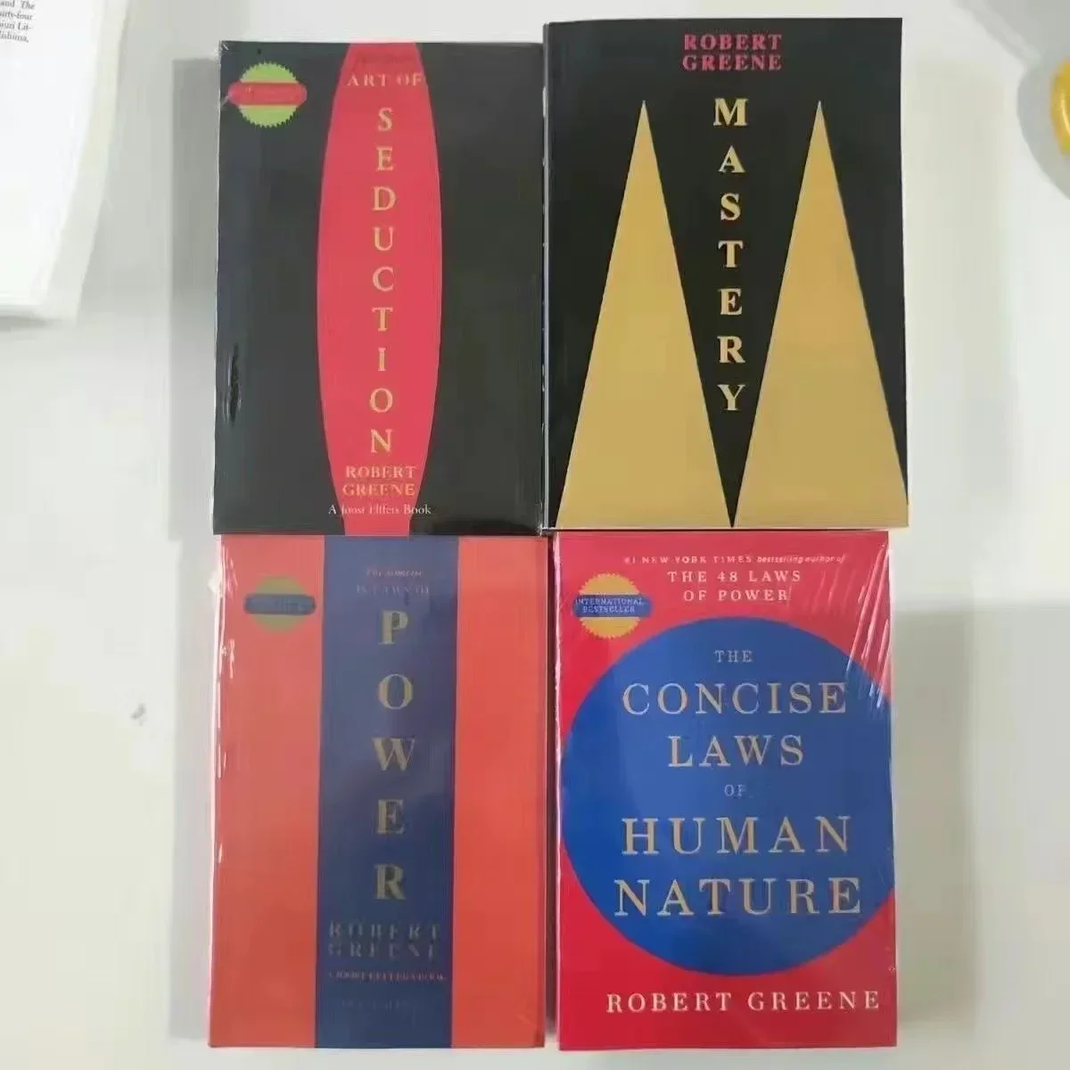 Фото Набор из 4 книг Роберта Грин The Concise 48 Laws of Power; The Concise Laws of Human Nature; Искусство соблазнения и мастерство №2